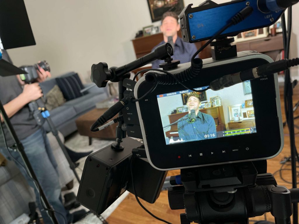 bts video production camera recording a person during podcast